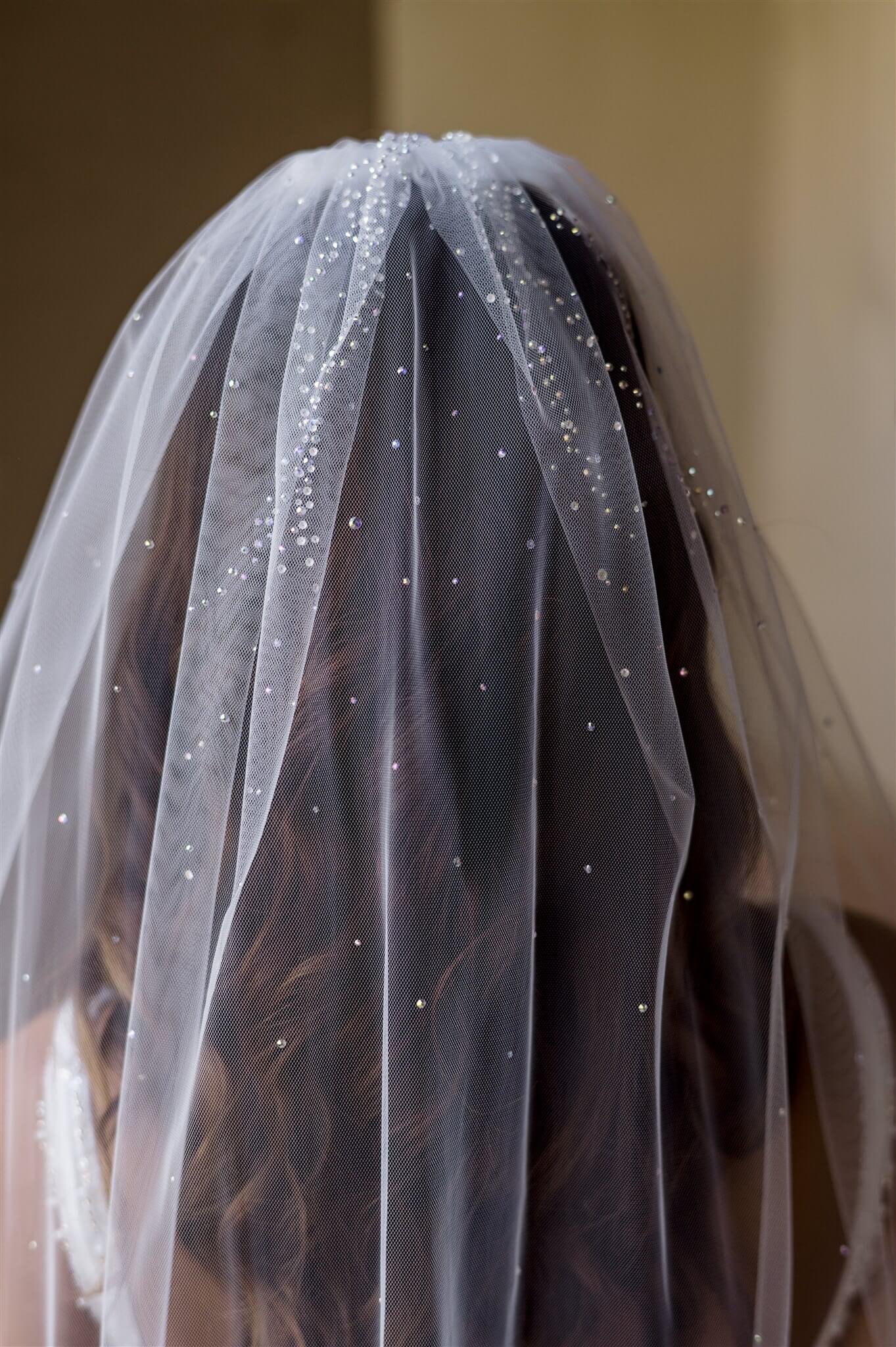 Close-up of a veil with sparkling details, blurred background